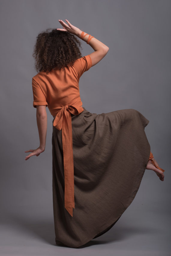 Back view of the linen wrap top showcasing its long belts