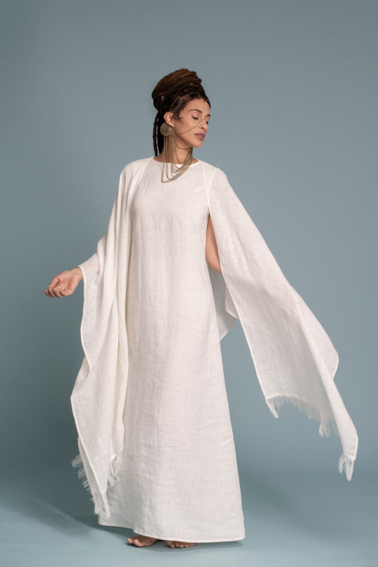 Casual styling of the Open-Weave Linen Cape in Milk White, suitable for everyday wear