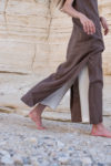 Galabeya dress styled with linen pants for a layered outfit.