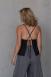 Back view of the Open Back Linen Top TULUM in black, featuring a crisscross strap design and open-back style