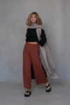 Front view of the YANK Cropped Linen Pants, showing the relaxed fit and minimalist design with no side seams or pockets