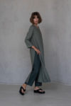 Minimalist Linen Tunic Dress KAYLO styled effortlessly with layered pants, featuring high side slits for movement.