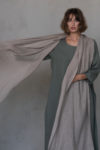 Neutral flax-colored scarf showcasing a breathable, lightweight linen design