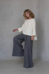 Model wearing the AGAM Full-Length Linen Palazzo Pants, paired with a light tunic for a minimalist, elegant outfit