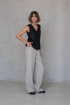 Side view of the BORA Linen Pants, showcasing the straight wide-leg cut and smooth drape of natural linen fabric