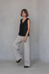 Model wearing the BORA Straight Wide-Leg Linen Pants in Natural Flax, paired with a tunic for a relaxed, elegant look.