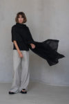 Black Gauze Linen Scarf styled minimally, perfect for enhancing a simple, elegant look.