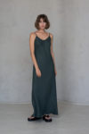 Bias-Cut Linen Dress VERED in dark green, featuring a bias-cut design and adjustable straps for a timeless, elegant fit