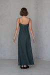 Back view of the Bias-Cut Linen Dress VERED in dark green, showcasing its minimalist style and flowing lightweight linen fabric.