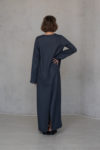 Back view of the Linen Dress BAGA, revealing the straight cut and timeless simplicity of its design."