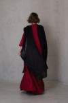 Black Gauze Linen Scarf styled full-length, showcasing its large size and flowing gauze linen material.