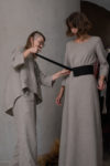 Alina Zilberman, designer of Shantima brand, helps to wear the belt on the model.