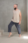 Man wearing a breathable linen sleeveless top, ideal for casual or summer layering.