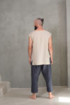 Back view of Handmade linen sleeveless top with clean lines and unisex appeal, perfect for minimalist fashion lovers.